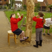 Pupils learning woodcarving